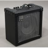 A Roland Cube 30 COSM combo amplifier, height 37cm, width 38cm.Buyer’s Premium 29.4% (including