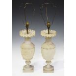 A pair of late 19th century carved alabaster table lamp bases, the ovoid bodies finely modelled with