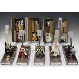 A group of eighteen modern miniature replica models of celebrity guitars by 'The Baby Axe Co Ltd',