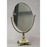 A mid-20th century brass framed and green onyx swing frame dressing table mirror, height 58cm, width