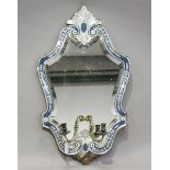 A late 19th century Venetian cartouche shaped girandole wall mirror, the sectional blue painted