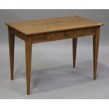 A 20th century French pine side table, fitted with a drawer, on tapering legs, height 71cm, width