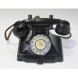 An early 20th century black 200 series telephone, the underside detailed '232 L.G.P.O 33/1', width