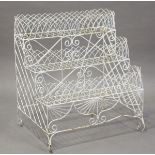 A late 19th/early 20th century white painted wirework three-tier waterfall plant pot stand, height