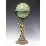 A 20th century gilt brass figural table globe, the 'Philips' 10" Challenge Globe' raised on a