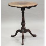 A George III mahogany tip-top wine table, the finely turned stem raised on tripod legs, height 71cm,
