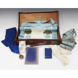 A group of mid-20th century Masonic regalia, including a silver oval medallion, a silver pendant,