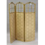 An early 20th century Neoclassical Revival giltwood three-fold dressing screen, inset with glazed