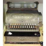 A late 19th century brass cased National counter-top cash register, the case bearing serial