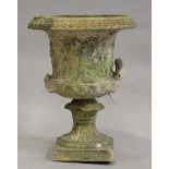 A 19th century moulded Coade style garden urn of classical campana form, height 68cm, diameter