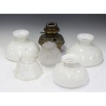 A group of mainly late Victorian glass oil lamp shades, chimneys and fittings.Buyer’s Premium 29.