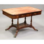 An early 19th century mahogany library table with boxwood line inlaid borders, the curved