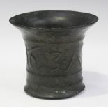 A 17th century bronze mortar, the sides initialled 'A.T.' and 'W.B.', bearing date '1653', height