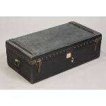 An early 20th century Louis Vuitton black canvas automobile trunk with wooden bound top and brass