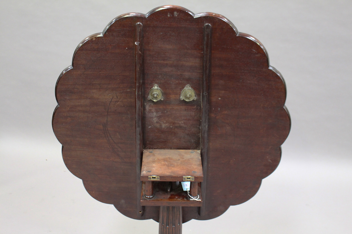 A George III mahogany tip-top supper table, the circular top later carved with nine roundels and - Image 2 of 5