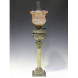 A late Victorian gilt brass and alabaster Corinthian column table oil lamp with a pink acid etched