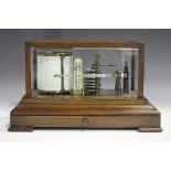 An early 20th century mahogany cased barograph with lacquered brass mechanism and clockwork