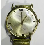 An Oriosa Swiss 9ct gold circular cased gentleman's wristwatch, the signed silvered dial with gilt