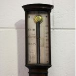 A Victorian mahogany stick barometer, the silvered rectangular dial with vernier scale and inscribed