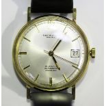 An R. & F.W. Dagley Hinckley Automatic 9ct gold circular cased gentleman's wristwatch, the signed