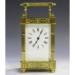 An early 20th century French lacquered brass cased carriage timepiece with eight day movement, the