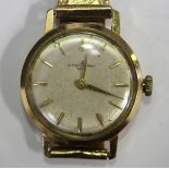 A Ulysse Nardin gold circular cased lady's wristwatch, the circular signed dial with baton hour