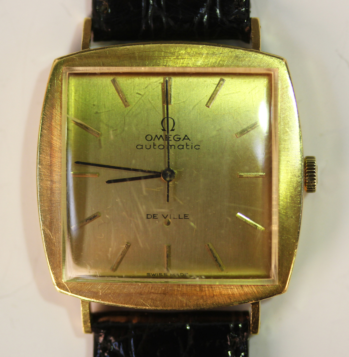 An Omega Automatic De Ville 18ct gold curved square cased gentleman's wristwatch, the movement