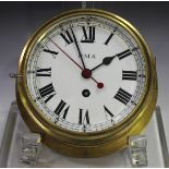 A mid-20th century brass ship's bulkhead timepiece, the brass movement with platform escapement,