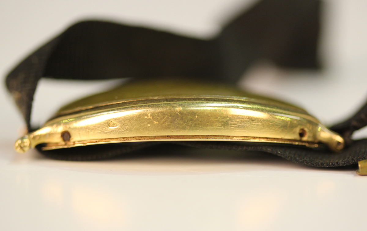 A gold curved rectangular cased wristwatch, the unsigned dial with black Arabic numerals, the case - Image 3 of 6