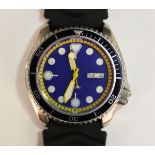 A Seiko Scuba Diver's steel cased gentleman's wristwatch, the replacement unsigned blue dial