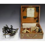 A mid-20th century oxidized and brass sextant by Heath & Co, within a fitted hardwood case, the