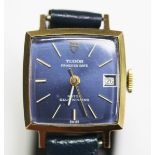 A Tudor Princess Date 9ct gold square cased lady's automatic wristwatch, the signed blue dial with