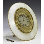 A Victorian onyx and gilt bronze strut timepiece, the drum cased movement with platform