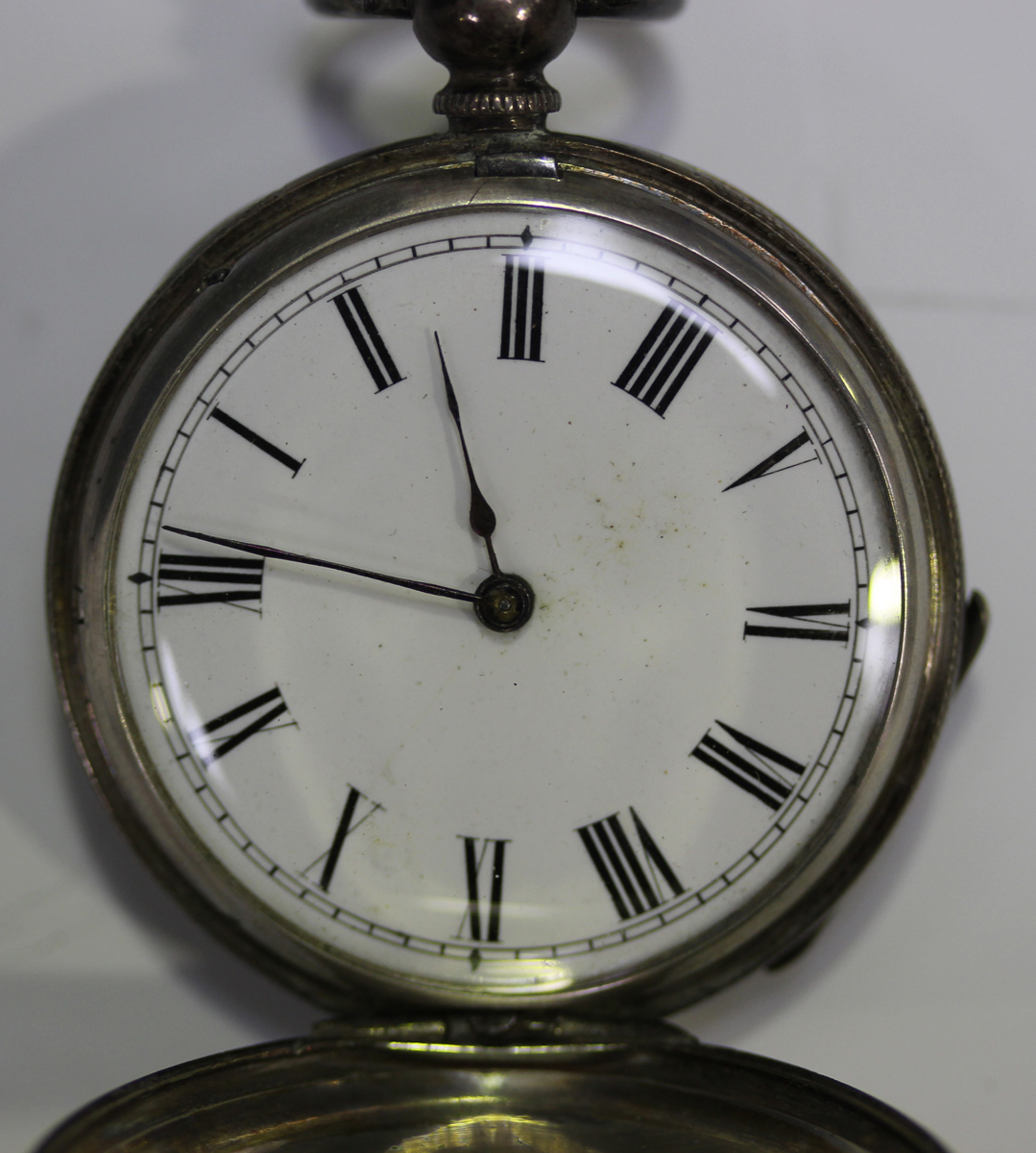 A base metal cased keyless wind open-faced goliath pocket watch, the jewelled lever movement - Image 6 of 15