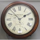 A late Victorian mahogany circular cased wall timepiece with brass single fusee movement, the