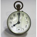 A 20th century keyless wind brass and magnified glass bullseye desk timepiece, the dial with black