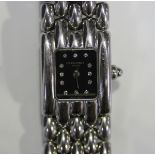 A Chaumet Paris steel lady's bracelet wristwatch, the signed black dial with diamond set numerals,