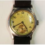 A Zenith steel circular cased gentleman's wristwatch, the signed silvered dial with Arabic numerals,