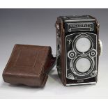 A Franke & Heidecke Rolleiflex twin-lens reflex camera, serial number '2,8F 2438121', with Heidosmat