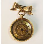 A gold cased keywind open-faced lady's fob watch with gilt cylinder movement, base metal inner case,