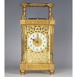 A late 19th/early 20th century French brass cased carriage clock, the eight day movement repeating