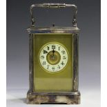 An early 20th century French silver plated brass cased carriage clock with eight day movement