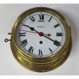 A mid-20th century brass circular cased ship's timepiece, the eight day movement with platform
