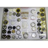 A collection of thirty-seven assorted Breitling wristwatch dials, including eight Navitimer dials in