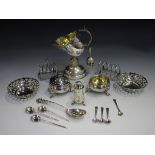 A small group of assorted silver items, including two 18th century circular salts, a .800 salt pig