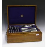 A Mappin & Webb part canteen of plated Albany pattern cutlery, within an oak box with removable