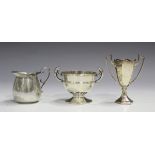 An Edwardian silver diminutive two-handled cup, Birmingham 1907, height 5cm, a silver two-handled
