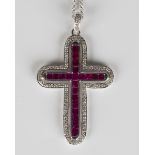 An 18ct white gold, ruby and diamond pendant cross, the centre mounted with a row of square cut