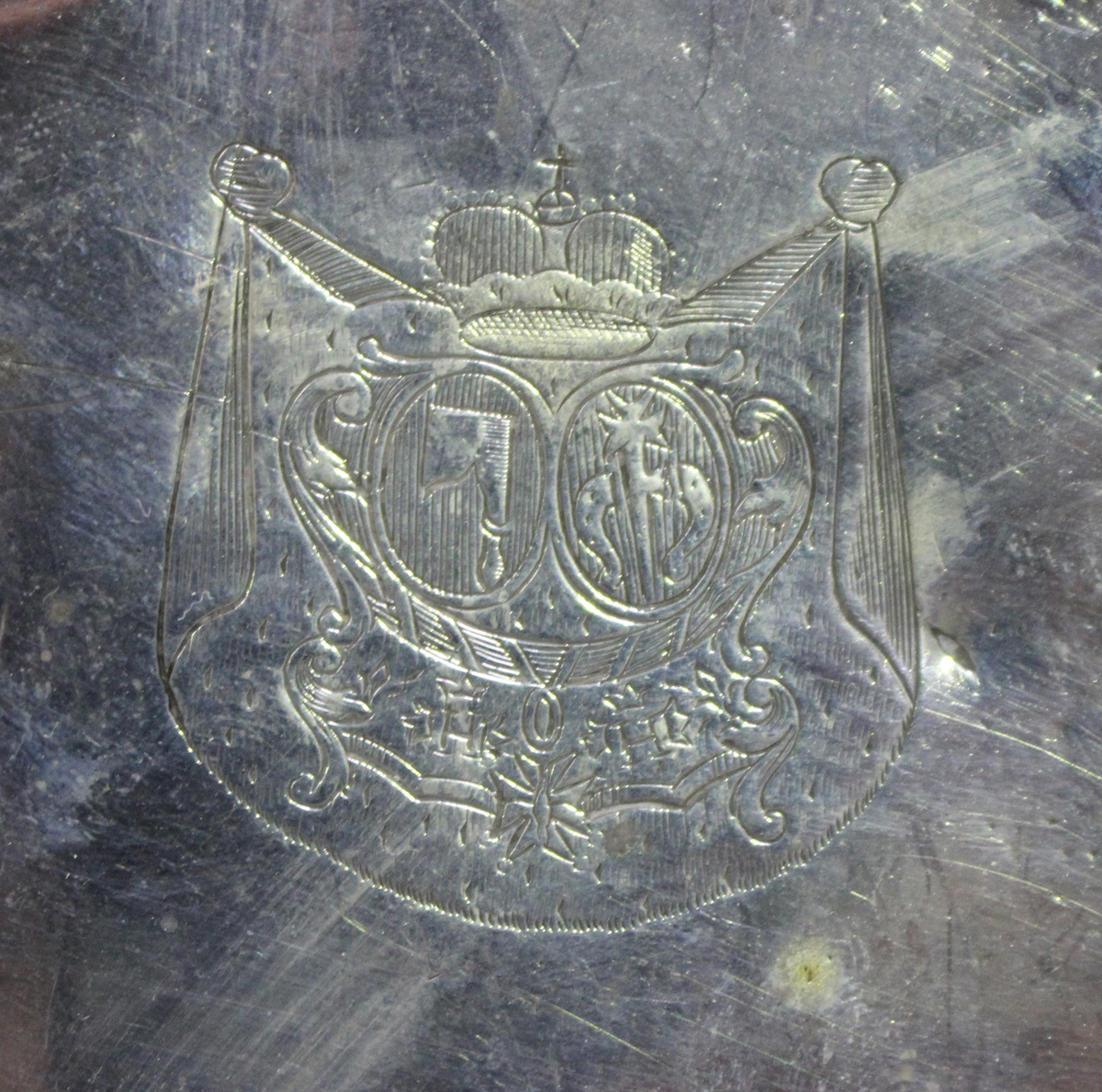 An 18th century Continental silver tray, probably French, of shaped oval outline, engraved with a - Image 3 of 3