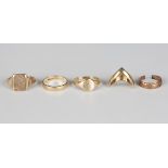 A 9ct gold and colourless gem set rectangular signet ring, a 9ct gold oval signet ring, a 9ct gold